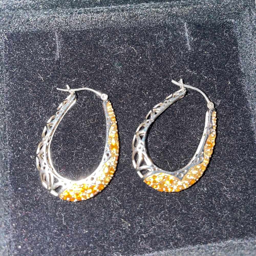 Sterling silver tear drop earrings with yellow rhi
